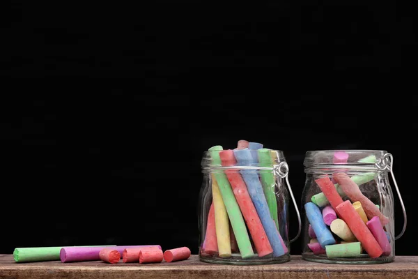 Jars with color chalks — Stock Photo, Image