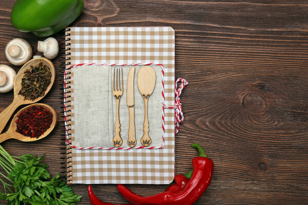 Decorated composition of recipe book and ingredients 