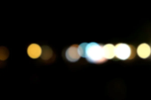 ボケ味は、夜ライトをデフォーカス — ストック写真
