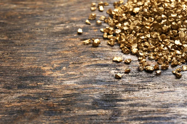 Een stapel van Gold nugget korrels — Stockfoto