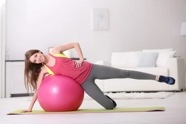 Girl doing exercises with fit ball — Stock Photo, Image