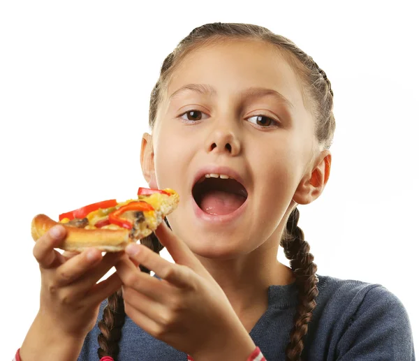 Flicka äter pizza — Stockfoto