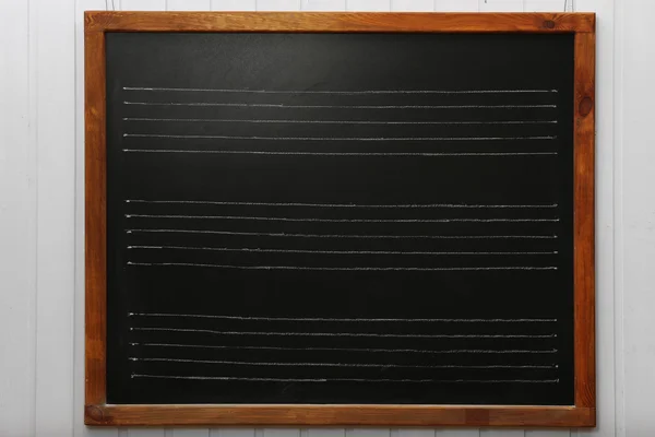 Lined blackboard on the wall — Stock Photo, Image