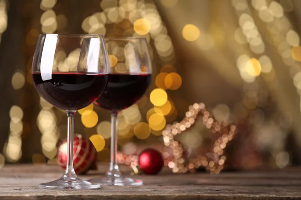 Red wine and Christmas ornaments — Zdjęcie stockowe