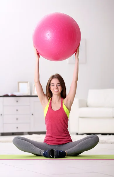Girl doing exercises with fit ball — Stock Photo, Image