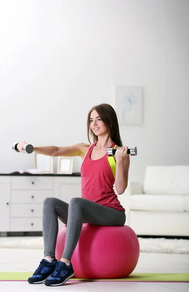 Young girl doing exercises — Stock Photo, Image