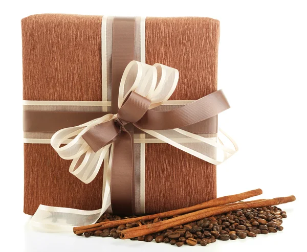 Gift with bow and coffee grains — Stock Photo, Image