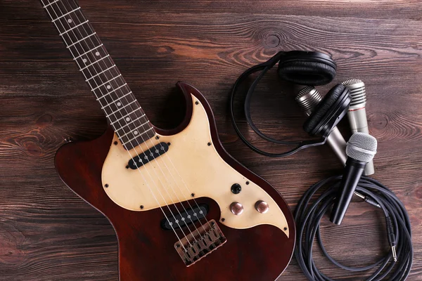 Electric guitar with microphones and headphones — Stock Photo, Image