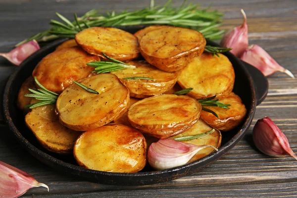 Delicious baked potato with rosemary — Stock Photo, Image