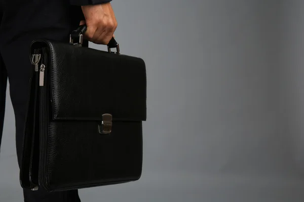 Elegant man in suit with briefcase — Stock Photo, Image