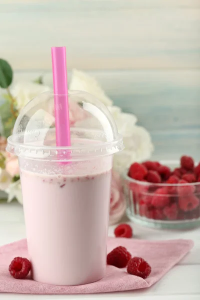 Plastic cup of milkshake — Stock Photo, Image