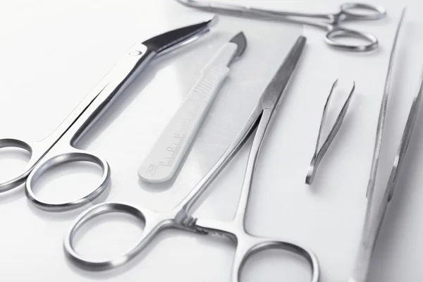 Surgery instruments isolated on white — Stock Photo, Image
