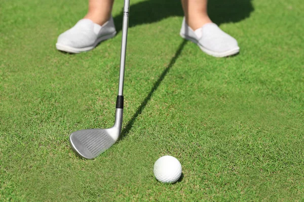 Golfer with club rolls up — Stock Photo, Image