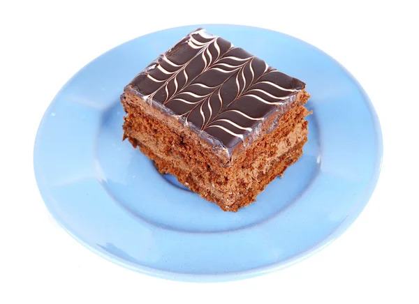 Sweet chocolate cake on blue plate isolated on white background — Stock Photo, Image
