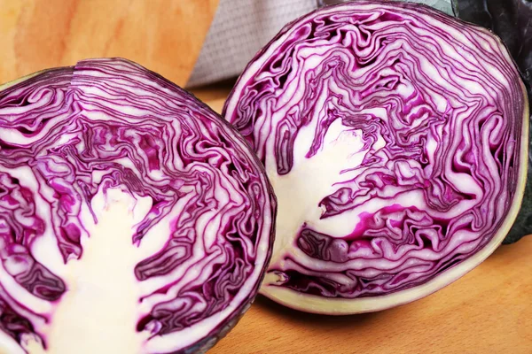 Red cabbage on wooden table — Stock Photo, Image