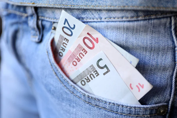 Euro banknotes in jeans — Stock Photo, Image