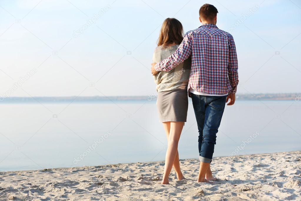 Young couple on the riverside