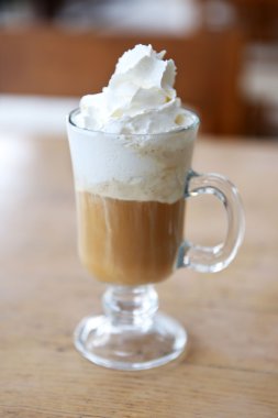 Iced coffee on table in cafe, closeup