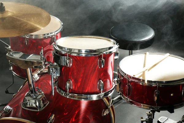 Drum set in smoke on a stage — Stock Photo, Image