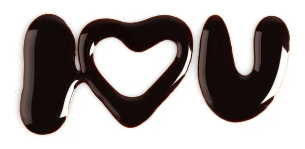 A zdanie "Kocham cię" napisany z czekoladą — Zdjęcie stockowe