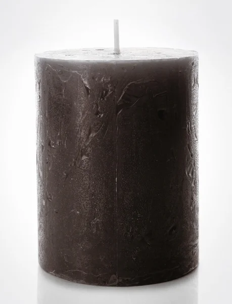 孤立在白色背景上的灰色的蜡蜡烛 — 图库照片