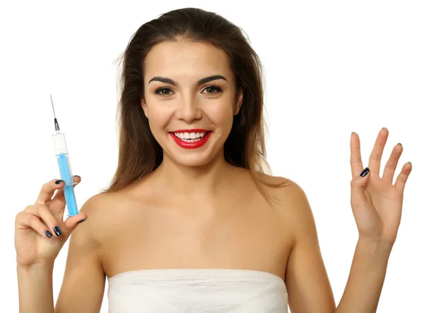 Woman with a gauze bandage  holding syringe — Stock Photo, Image