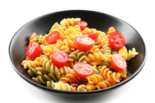 Delicious macaroni dish in black bowl isolated on white background — Stock Photo, Image