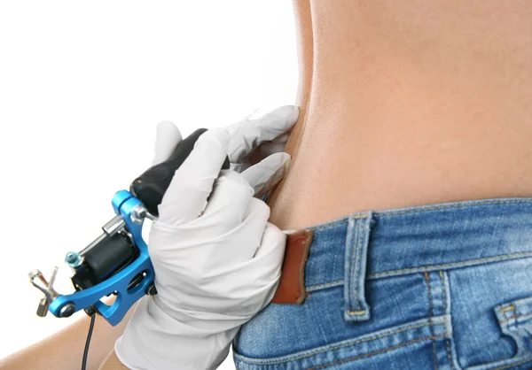 Hands with gloves making tattoo — Stock Photo, Image