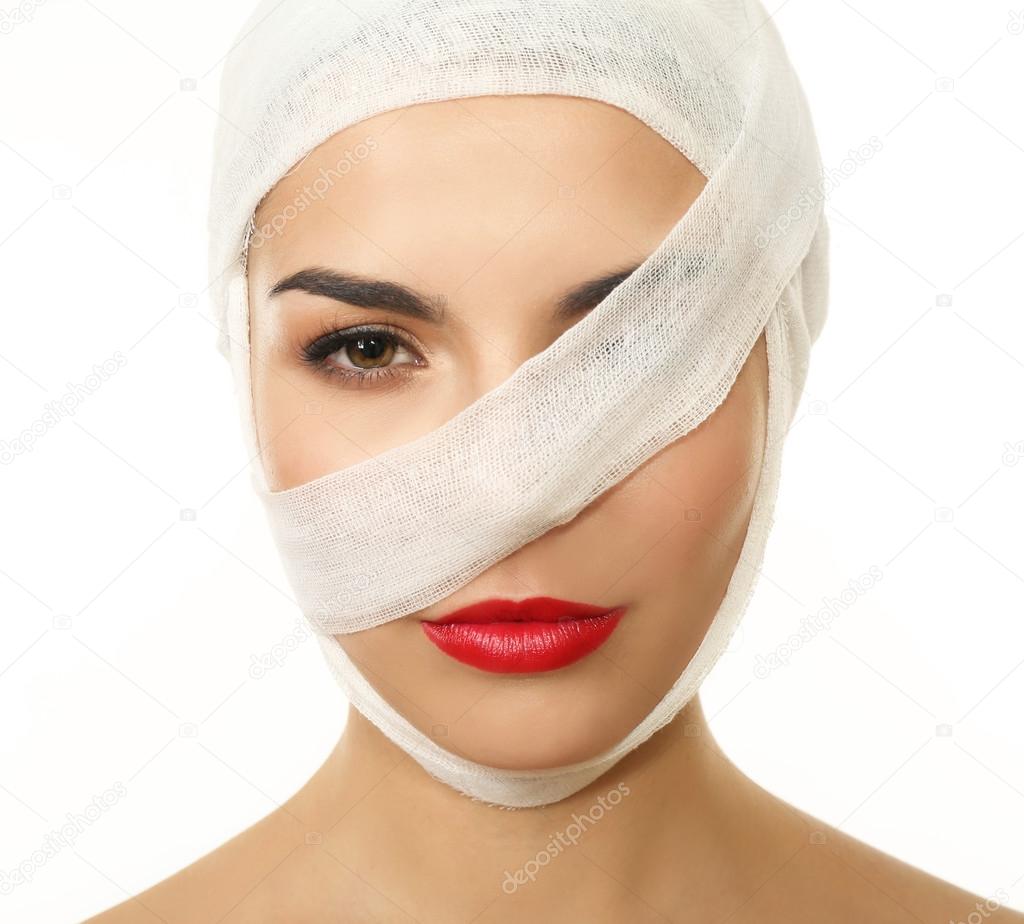 beautiful woman with a gauze bandage