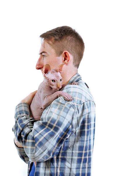 Young man holding a cat, isolated on white — Stock Photo, Image