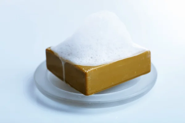 Pieza de jabón con espuma —  Fotos de Stock
