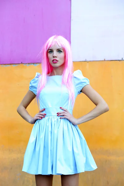 Beautiful woman with pink hairstyle — Stock Photo, Image