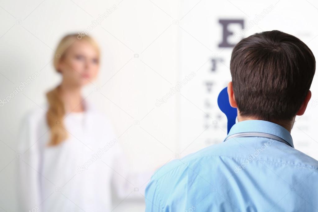 Female doctor examing patient