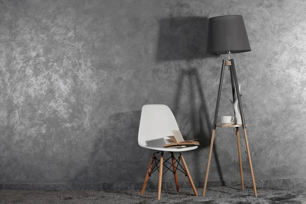 Stylish conception with chair and lamp — Stock Photo, Image