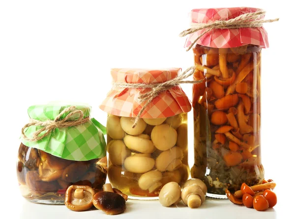 Marinated mushrooms in glass jars — Stock Photo, Image