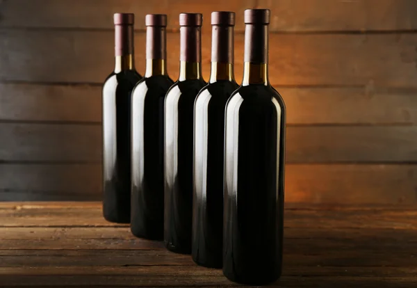 Wine bottles in a row — Stock Photo, Image