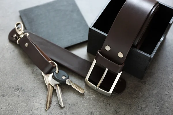 Leather belt with buckle and gift box — Stock Photo, Image