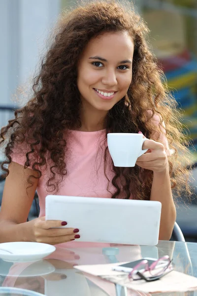 Beautiful young lady with tablet — Stock Photo, Image