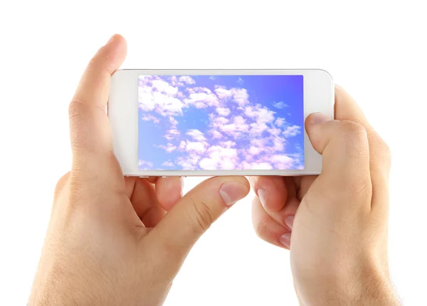 Händer som håller smarta mobiltelefon — Stockfoto