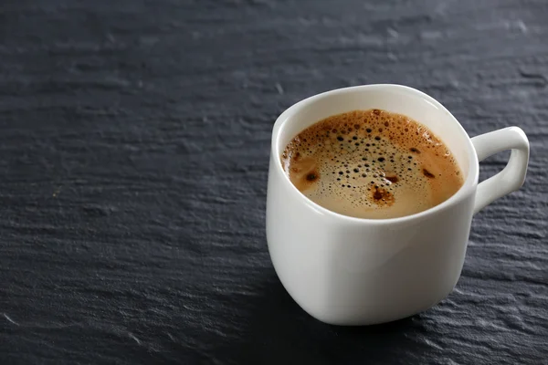 Cup of coffee on table — Stock Photo, Image