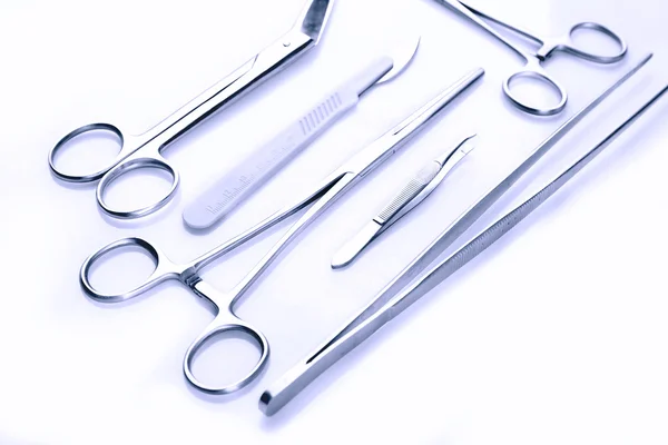 Surgery instruments on white — Stock Photo, Image