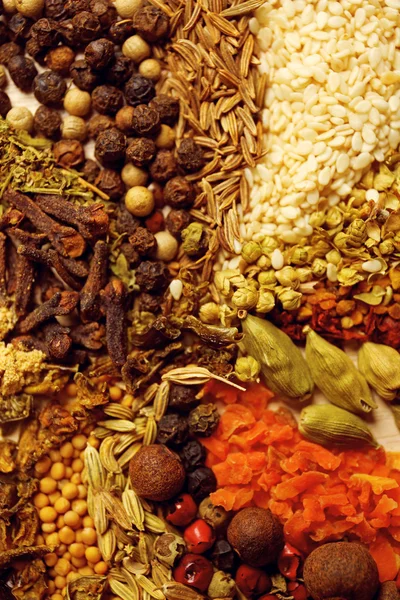 Variety of spices on the kitchen table, close-up — Stock Photo, Image