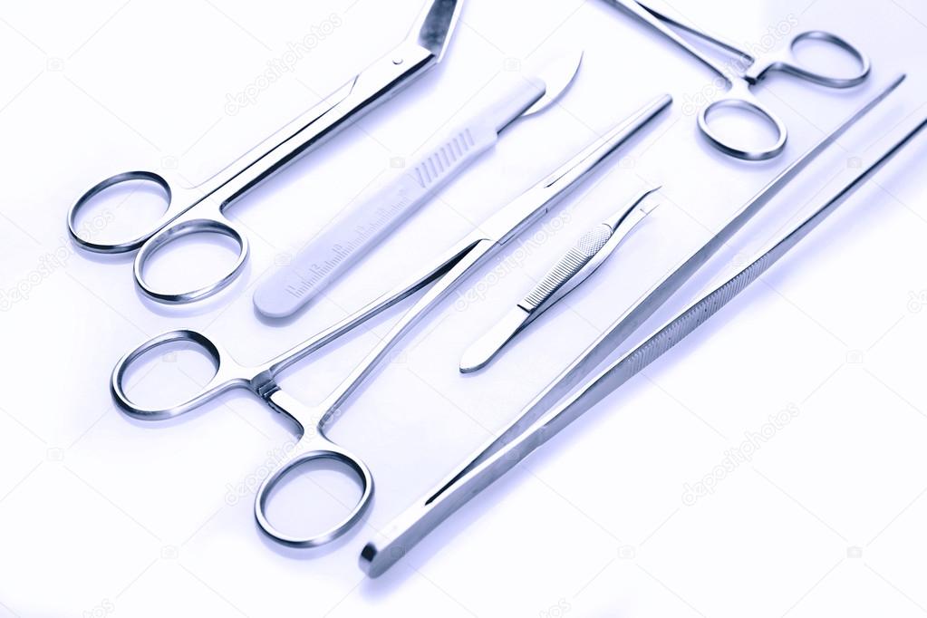 Surgery instruments on white