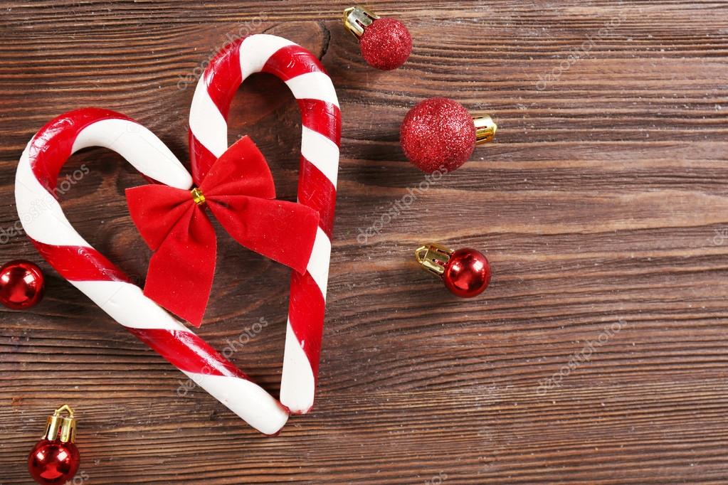 Christmas Candy Canes With Christmas Decoration On Table Close Up