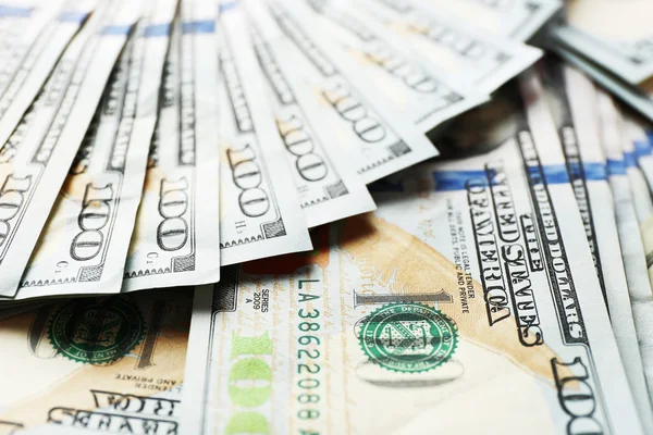 Fläkten formade hundra dollar i kontanter som bakgrund — Stockfoto