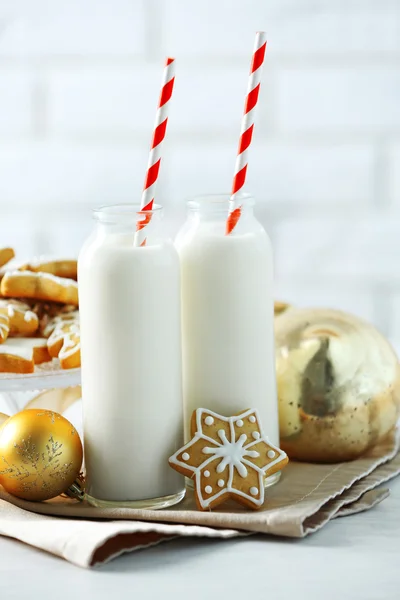 Beautiful composition with Christmas cookies and milk — Stock Photo, Image