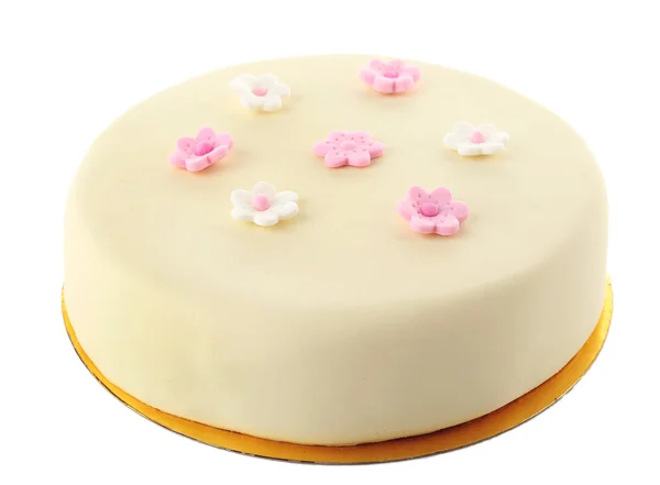 Cake met suiker plakken bloemen, geïsoleerd op wit — Stockfoto