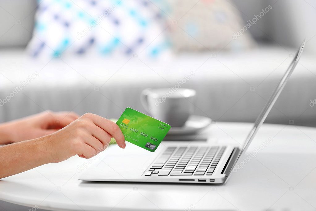 Female making online payment, close up