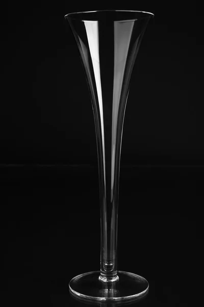 Empty champagne glass on black background — Stock Photo, Image