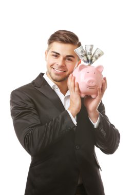 Elinde para tutan adam.